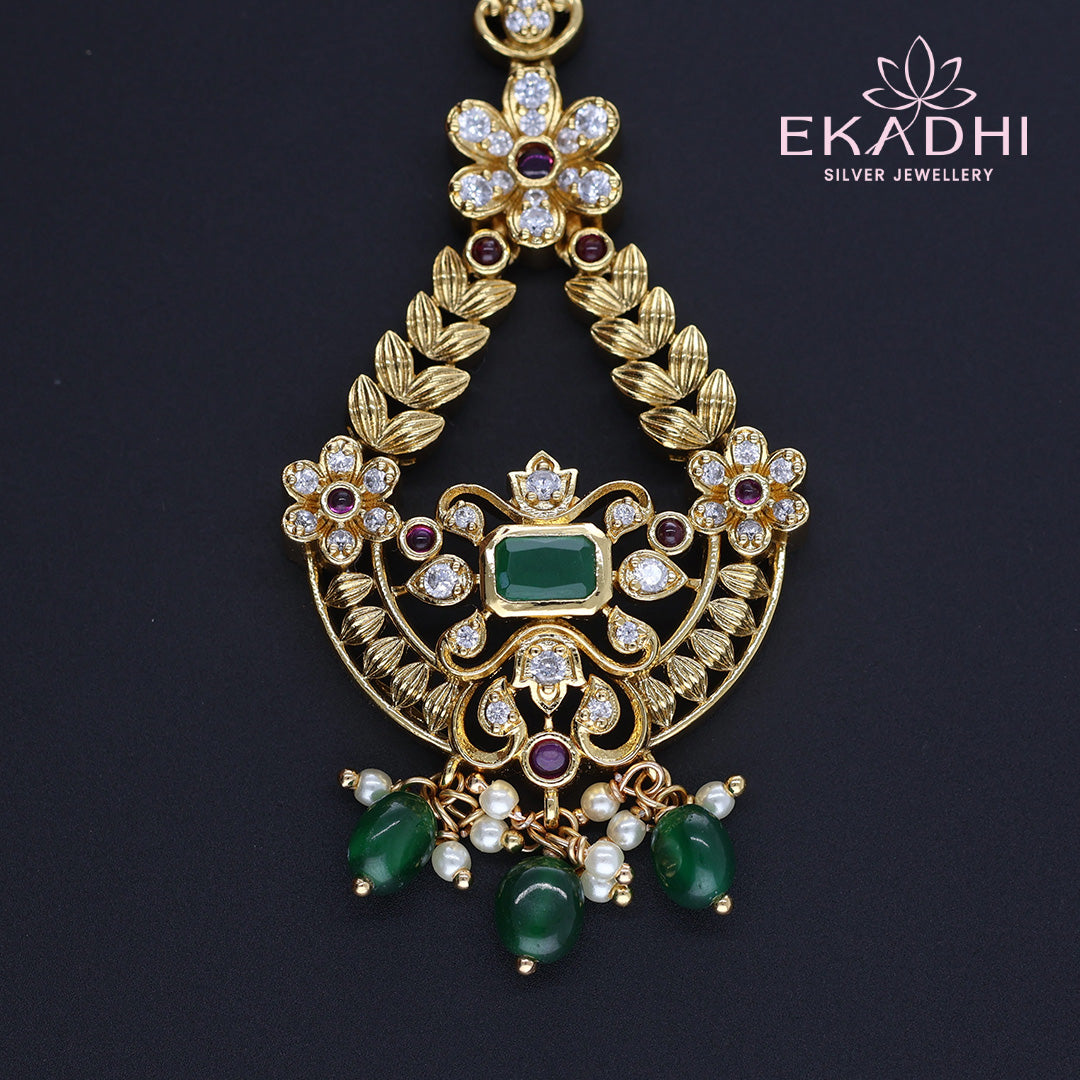 HJ13328 – Floral Nakshi Maang Tikka with Antique Finish