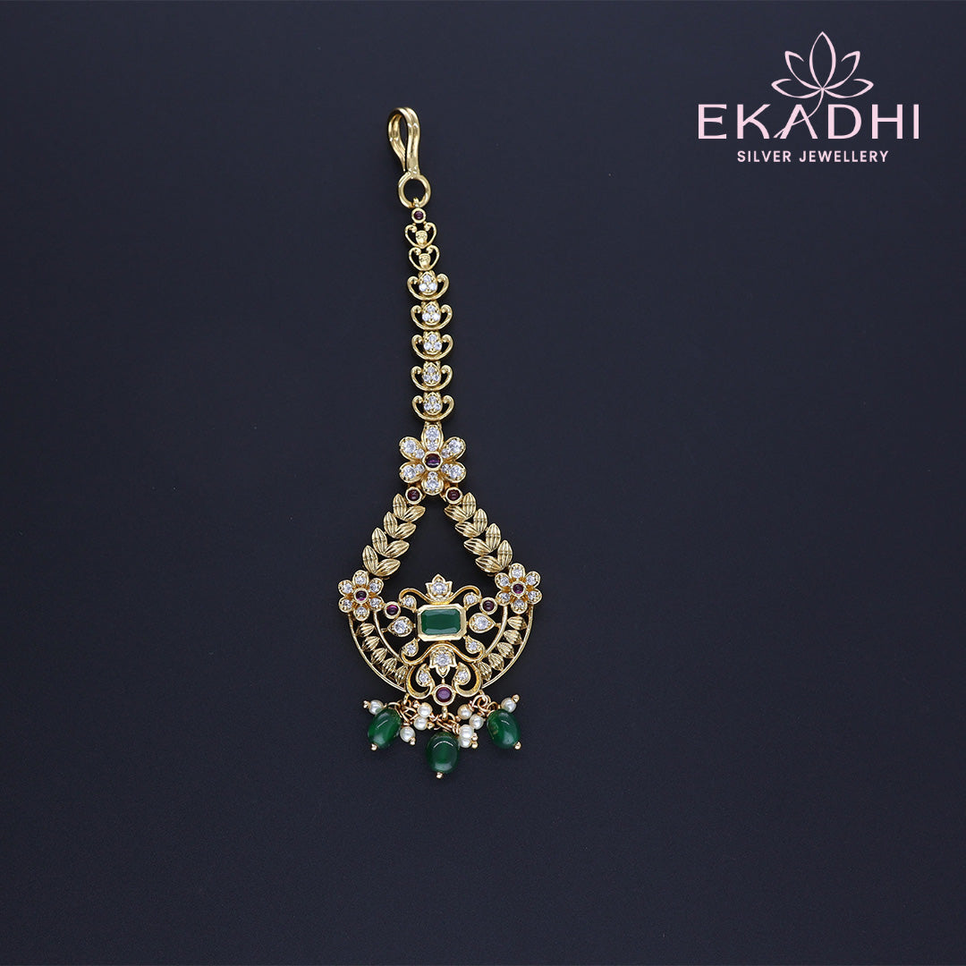HJ13328 – Floral Nakshi Maang Tikka with Antique Finish