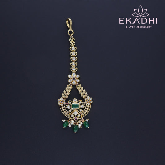 HJ13328 – Floral Nakshi Maang Tikka with Antique Finish